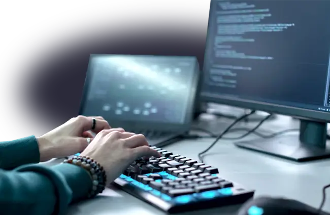 An ISOutsource support technician working at a keyboard